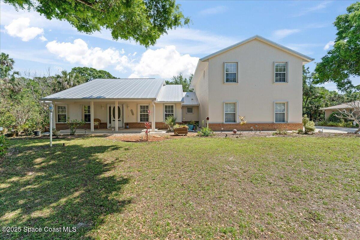 3 Car garage home on .46 Acre. NATURE abounds in your backyard private retreat!