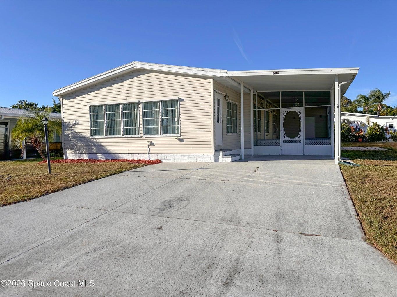 606 Dolphin Circle, Barefoot Bay, FL, 32976
