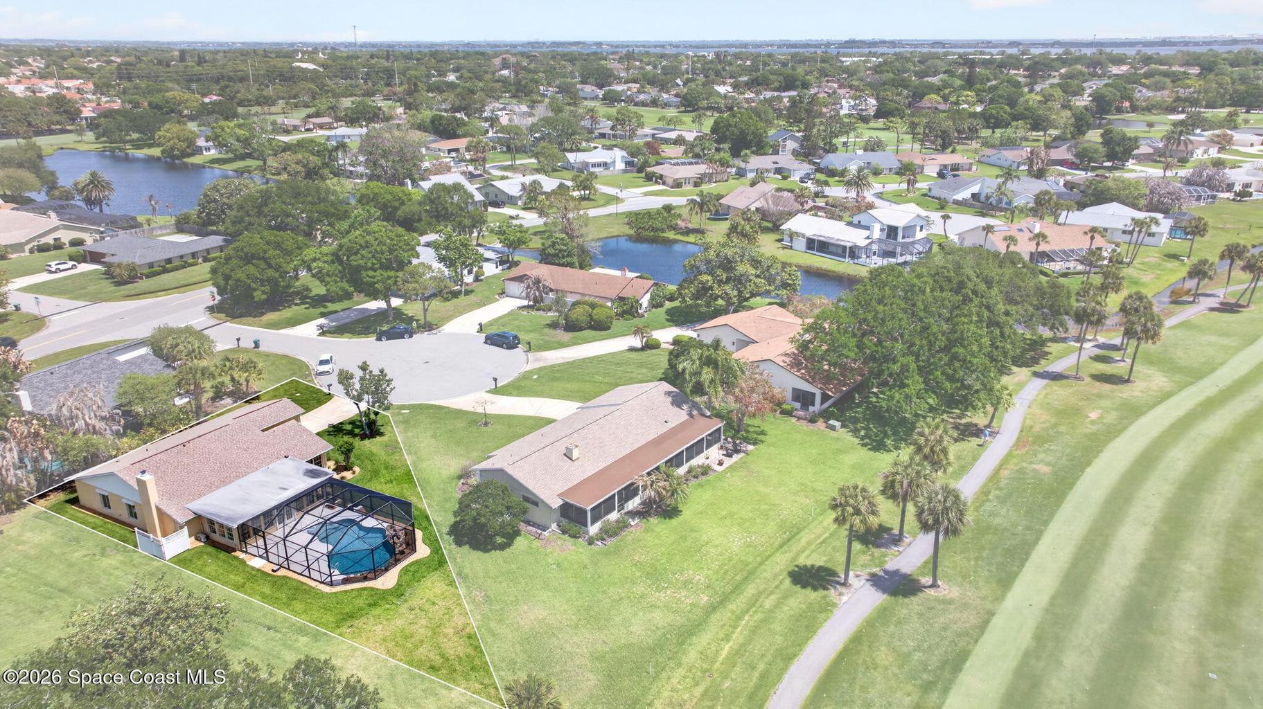Space and beauty surround the completely remodeled SUNTREE POOL home situated on the 2nd Fairway of the Suntree Classic Course