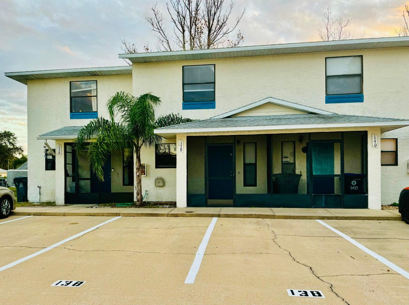 Front of unit, 2 assigned parking spaces and plenty of open spaces for guest