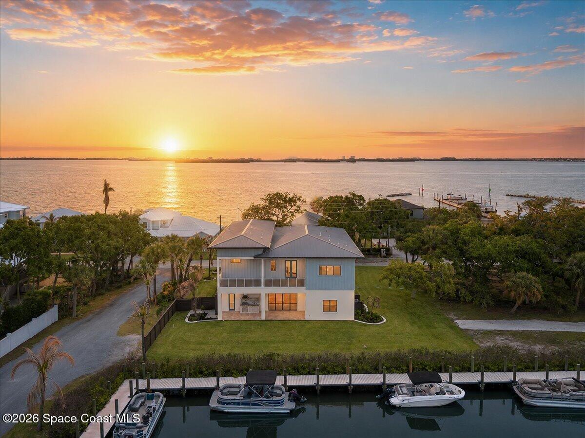 VIDEO LINK: https://pinkflamingophoto.hd.pics/1295-S-Banana-River-Dr/idx Featuring 21 Home-sites with 5 Distinctive Custom Floor-plan Designs from 2800sf living to 4800+- Living
