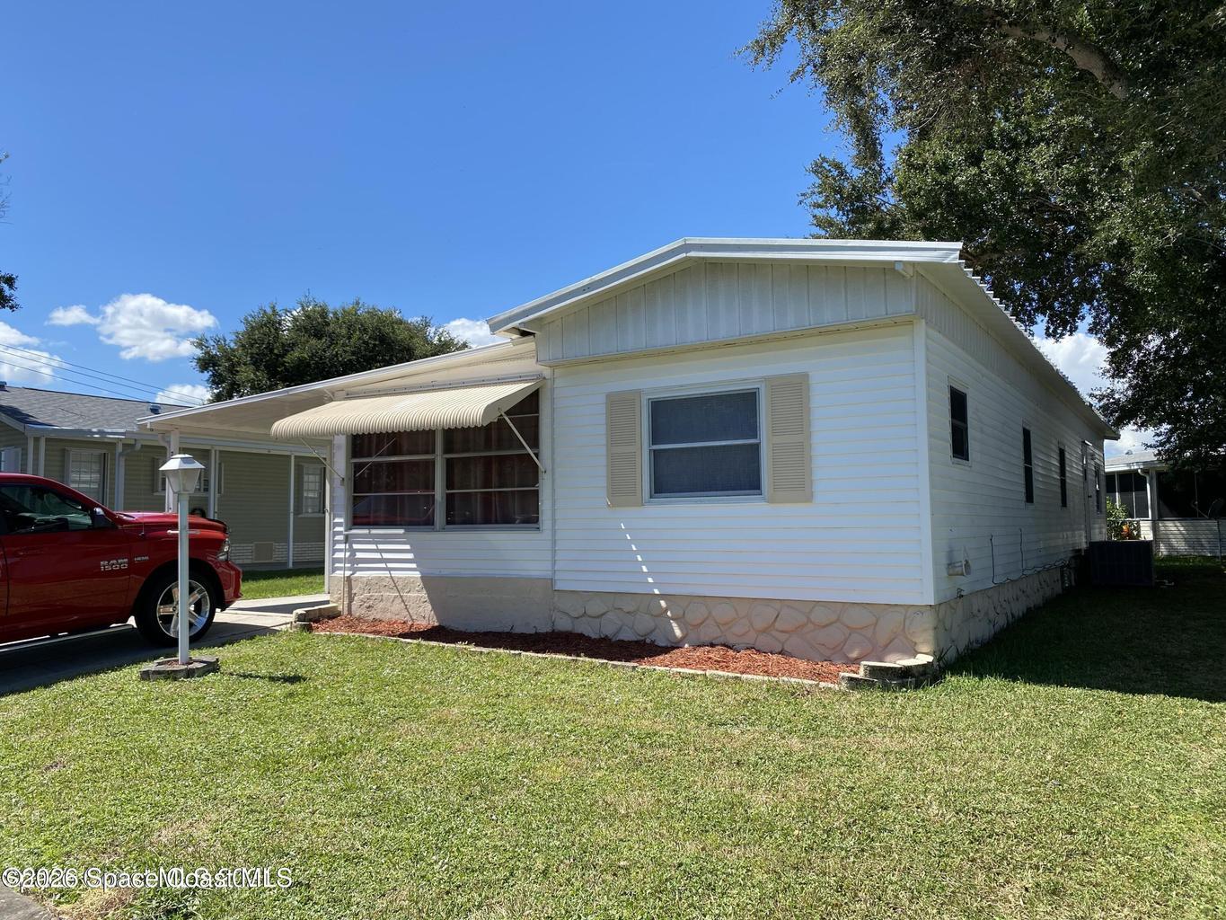 703 Lark Drive, Barefoot Bay, FL, 32976