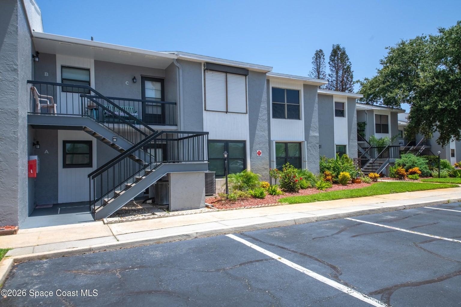 1st floor unit, front door located out of view behind the stairwell