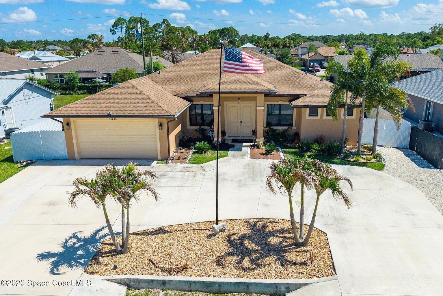 Distinctive curb appeal begins with a circular driveway, impressive entry, and timeless design.
