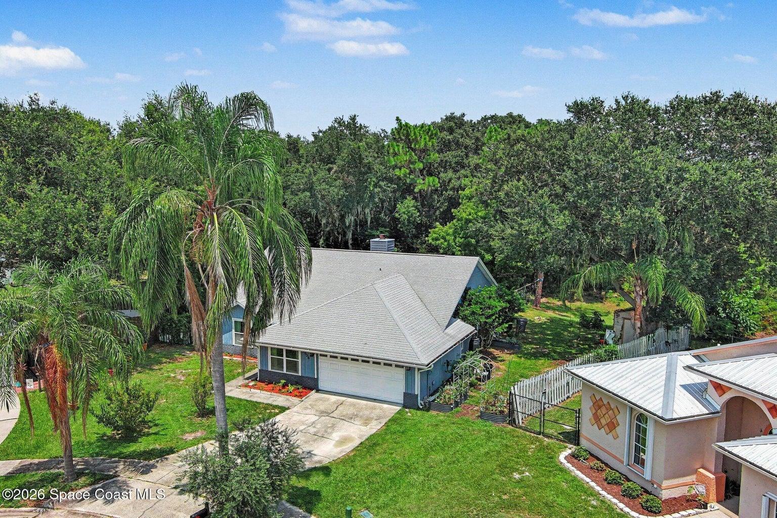 Backs up to over 12 acres of trees