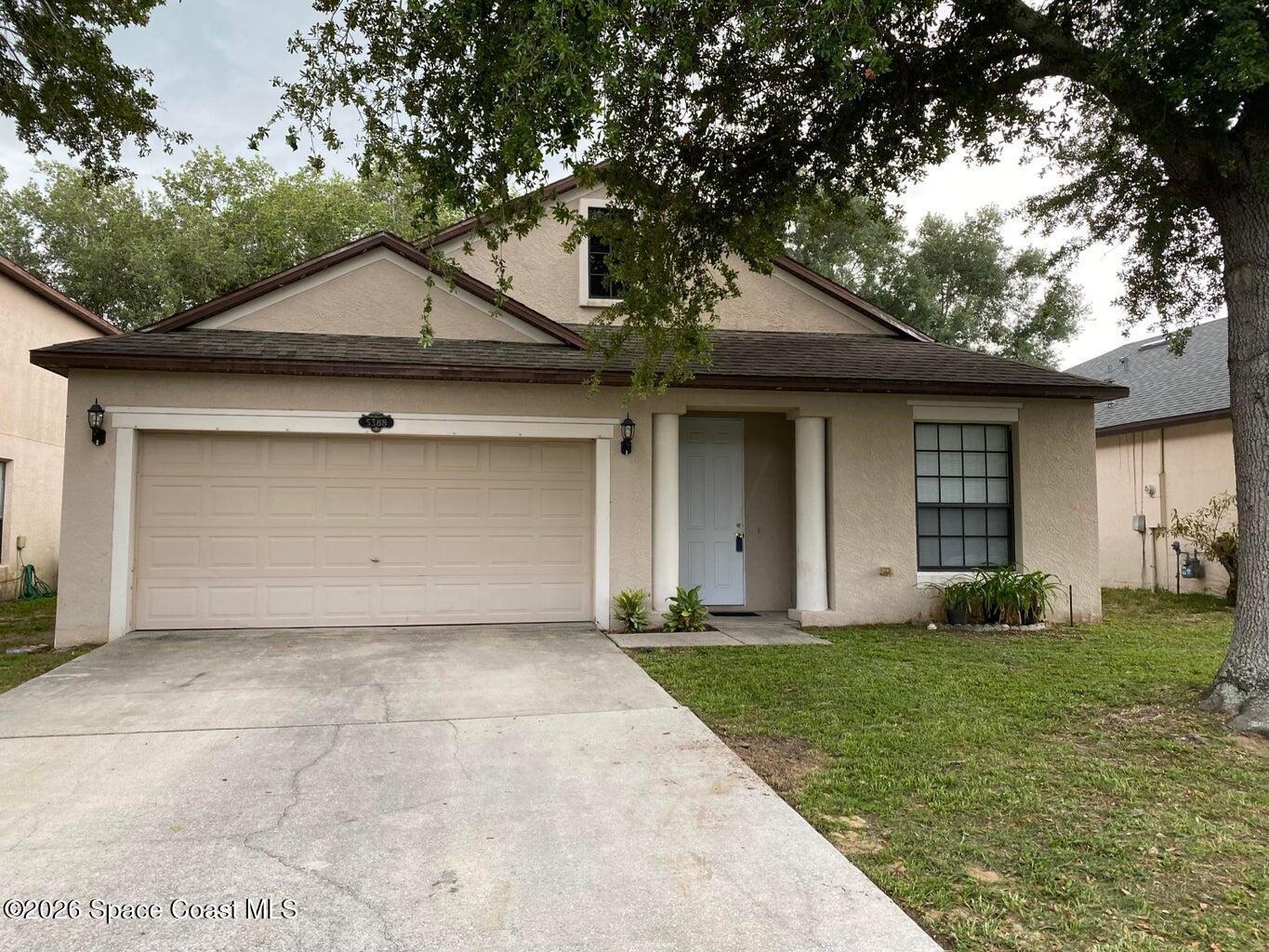 Concrete Block home with over 1,700 SF! 3 bedrooms, 2 full baths and 2 car garage!
