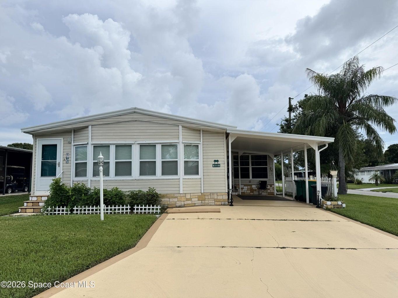 Exterior Front Double Driveway Single Carport Corner Lot