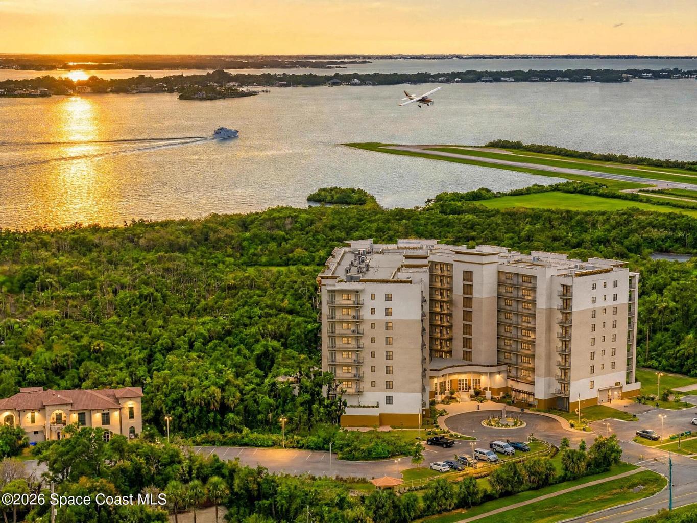 Modern architecture and gated privacy introduce River Fly-In, an aviation-inspired community beside Merritt Island Airport.