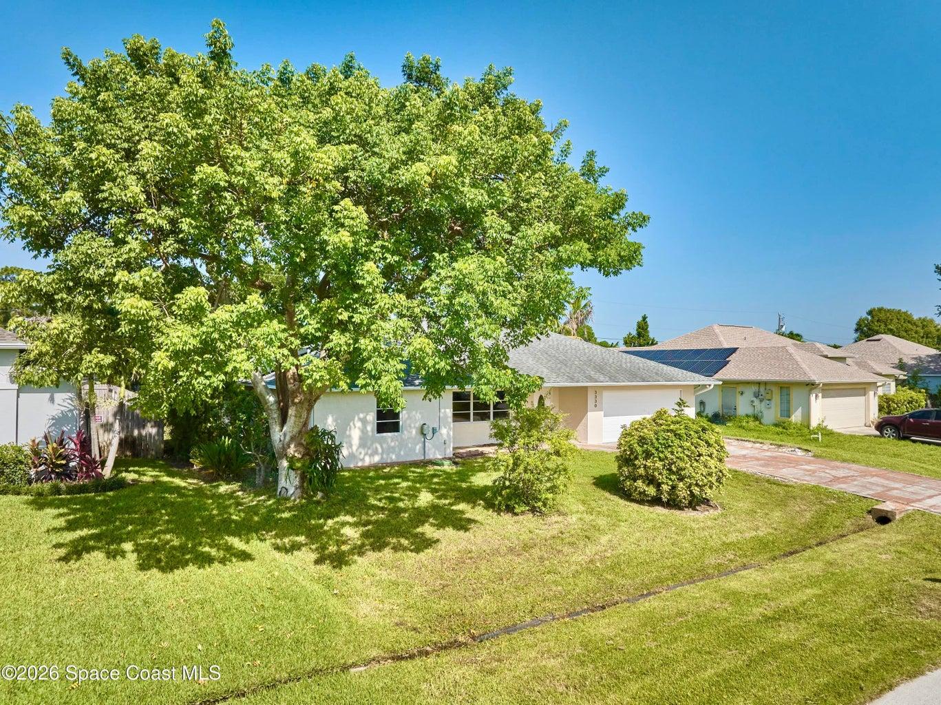 CBS Vintage Charmer loc'd in a desirable neighborhood now surrounded by Newer Constructed Homes. Ideal for INVESTORS, RENOVATORS and/or BUYERS w/a Vision. 2BR, 2BA, 2CGar w/500+sf cov'd screened lanai overlooking a spacious backyard