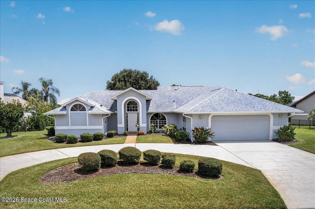 Large circular drive to accommodate all your house guests, along with a two car garage.