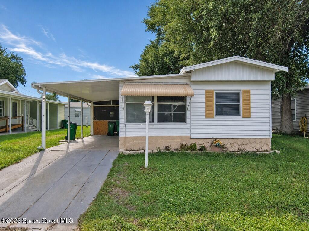 703 Lark Drive, Barefoot Bay, FL, 32976