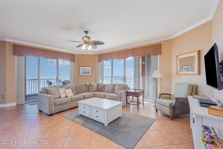 Living Room with wrap around floor to ceiling windows