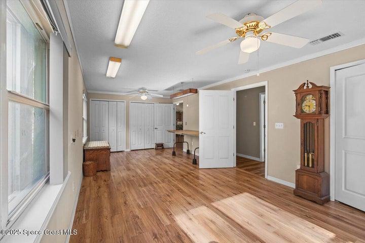 Owner converted 2nd & 3rd bedrooms into one large sewing room
