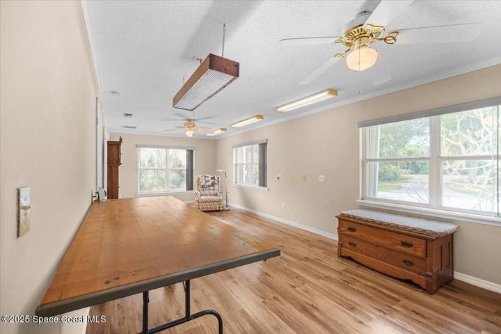 Owner converted 2nd & 3rd bedrooms into one large sewing room