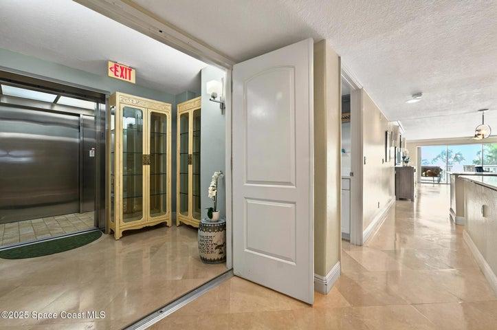 Larger foyer with custom cabinets to create your own personal vestibule.