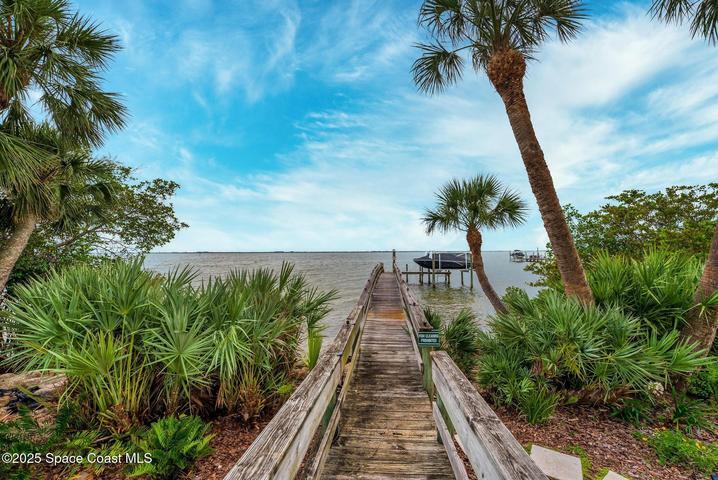 Fishing dock with boat slips