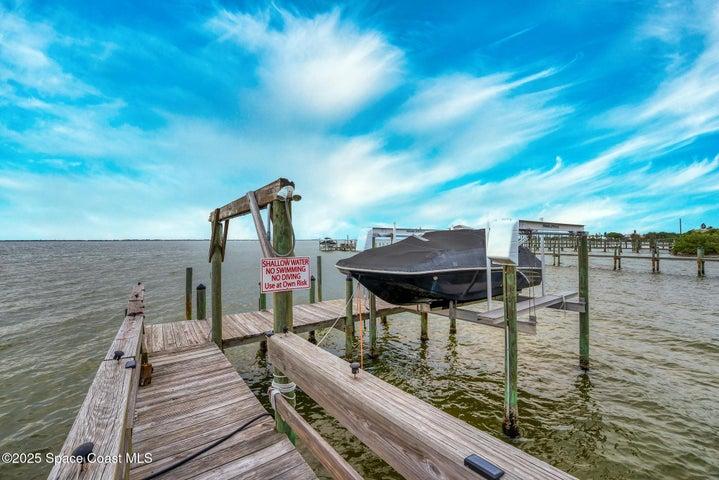 Fishing dock with boat slips