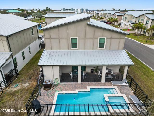 Elevated Rear View of Home and Pool/Jacuzzi