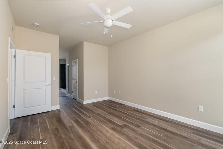 Primary bedroom to His & Her closets to bath