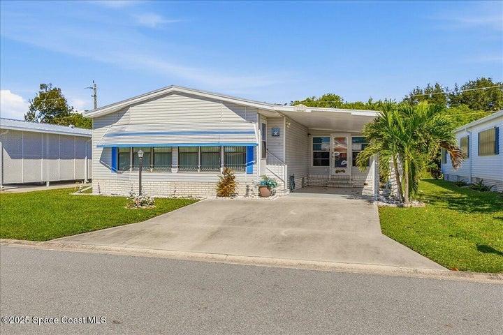 1131 Tequesta Drive, Barefoot Bay, FL, 32976 photo 2