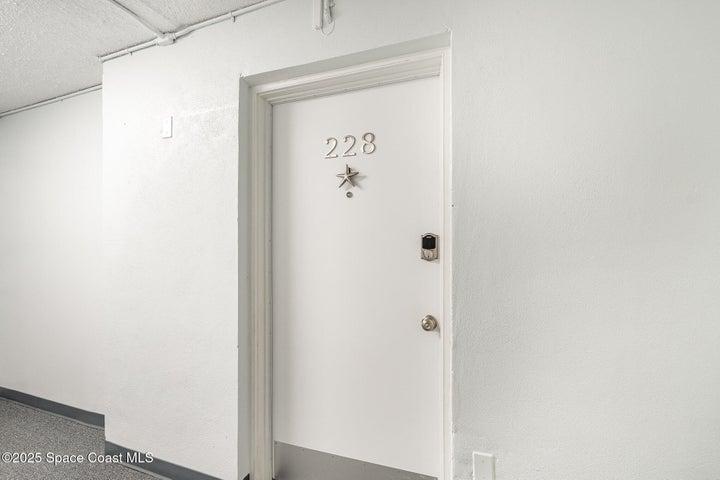 Enter into 957 sqft of beachside living