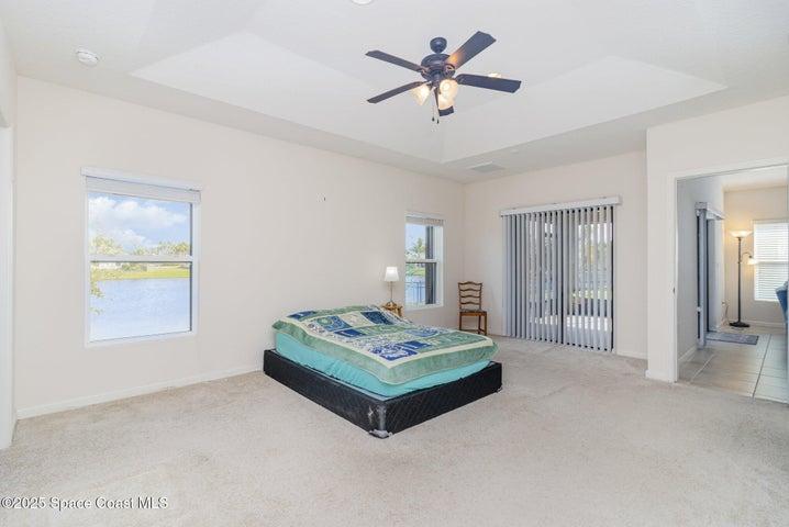 Tray Ceiling. Carpet, Slider to Screened-In Patio.