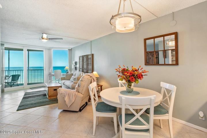 Breakfast nook flanks open kitchen and family room bathed in sunlight!
