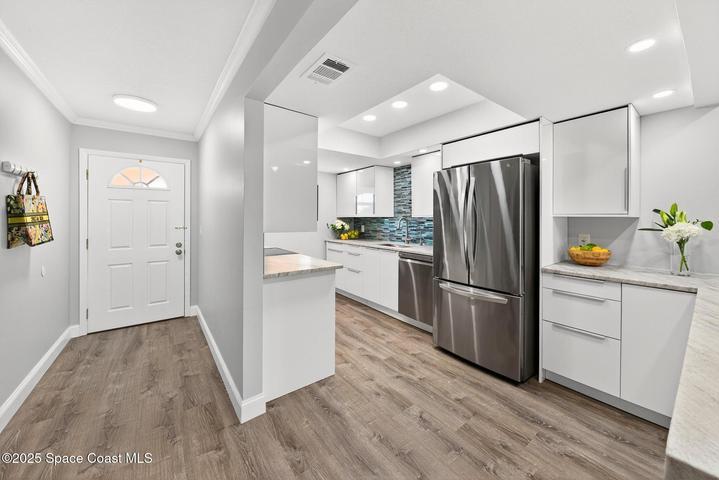 Renovated Kitchen with stainless steel aplliances.