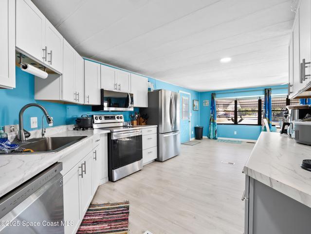 1040 Waterway Drive, Barefoot Bay, FL, 32976 photo 10