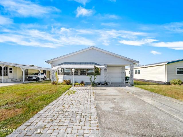 1040 Waterway Drive, Barefoot Bay, FL, 32976 photo 2