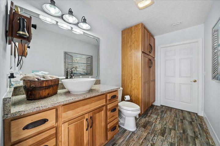 1/2 bath off porch in the pool home