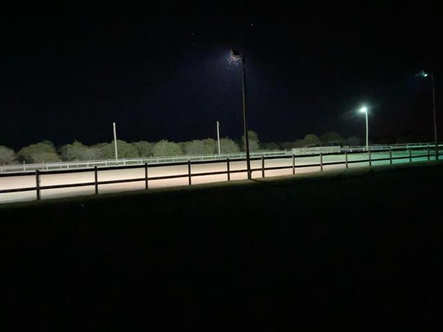 Arena lit up in the evening