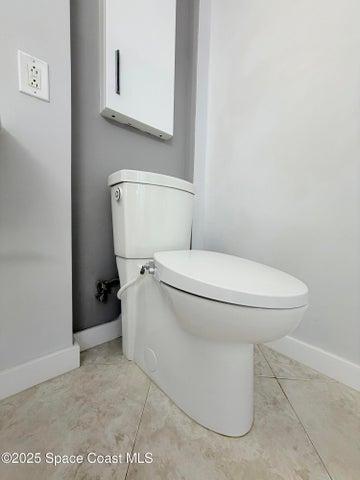 touchless flushing toilets