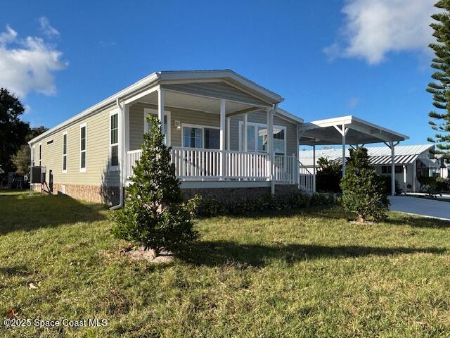 723 Hyacinth Circle, Barefoot Bay, FL, 32976 photo 2