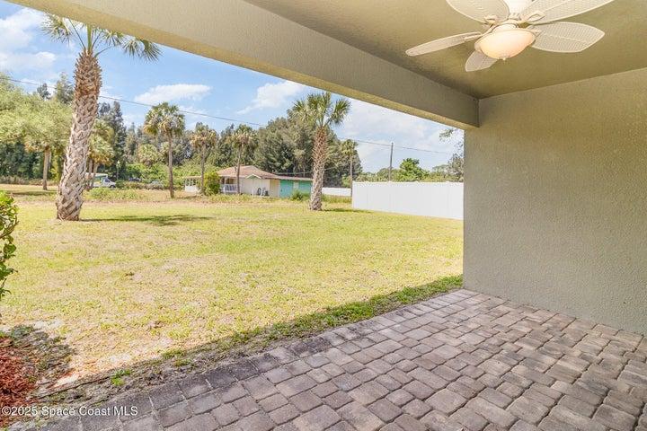 Covered Rear Lanai Porch with Paver Stone and Ceiling Fan...