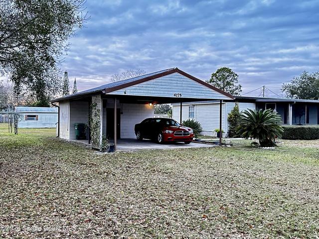 With large laundry room at the back end