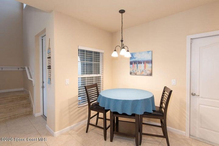Charming dining area with natural light.