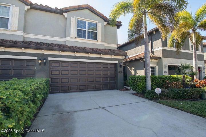 Attached two-car garage and driveway.