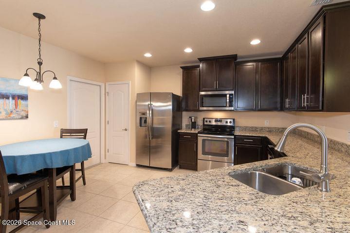 Ample granite counter space for cooking.