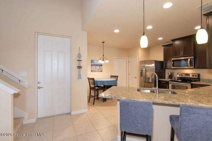Welcoming entryway into open floorplan.