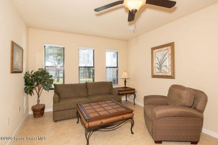 The heart of the home features an open, airy layout with large windows that fill the space with natural light.