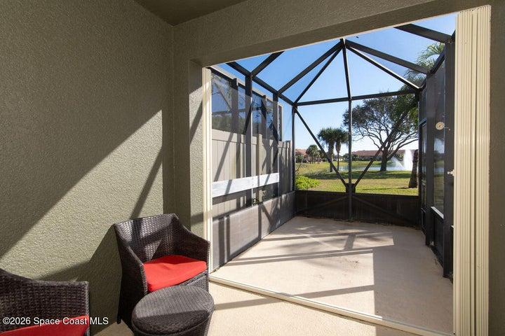 Enjoy peaceful mornings in this private, screened-in retreat, perfectly designed for lounging while taking in the fresh air and water views.