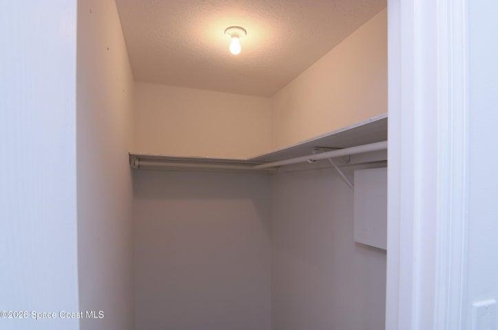 Primary Bedroom walk-in closet