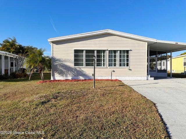 606 Dolphin Circle, Barefoot Bay, FL, 32976 photo 2