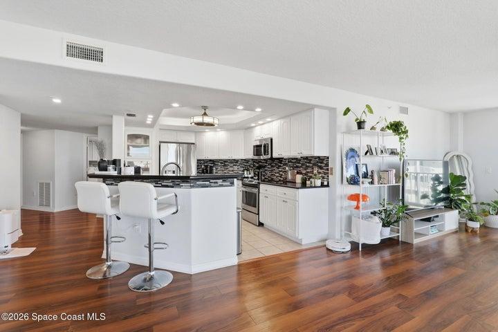 Upgraded Dimmable Canned and Adjustable Lighting in Kitchen