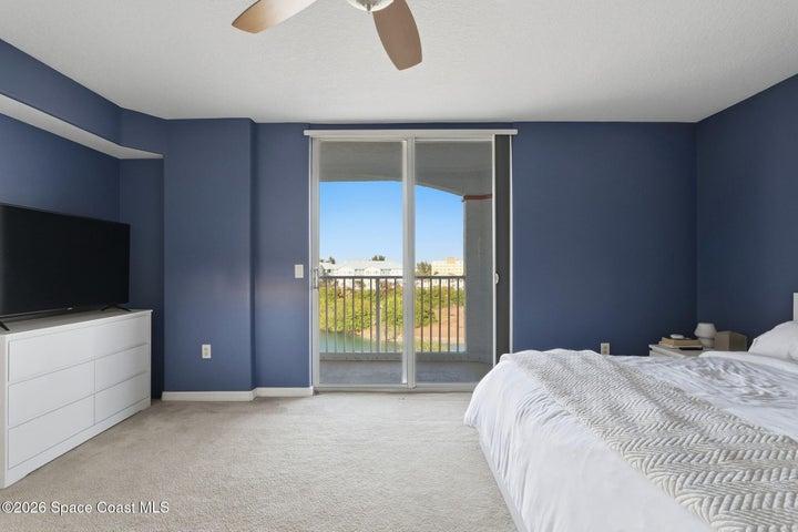 Master with balcony Access with Hunter Douglas Thermal and Black out pull shut blinds on all Sliders