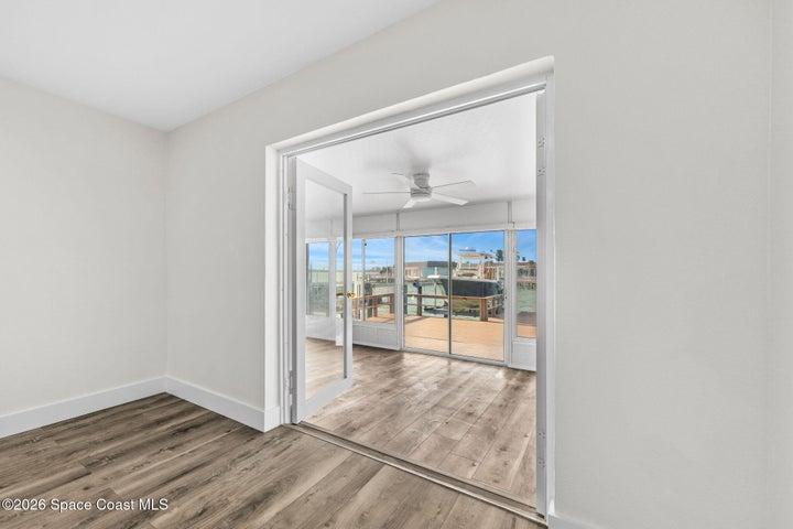 French doors from primary to sunroom