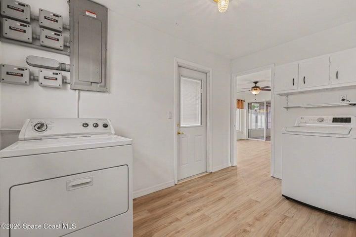 laundry room with rear door to yard