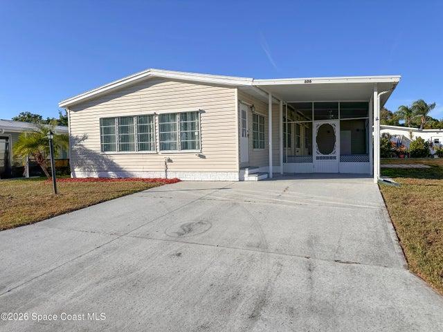 606 Dolphin Circle, Barefoot Bay, FL, 32976 photo 1