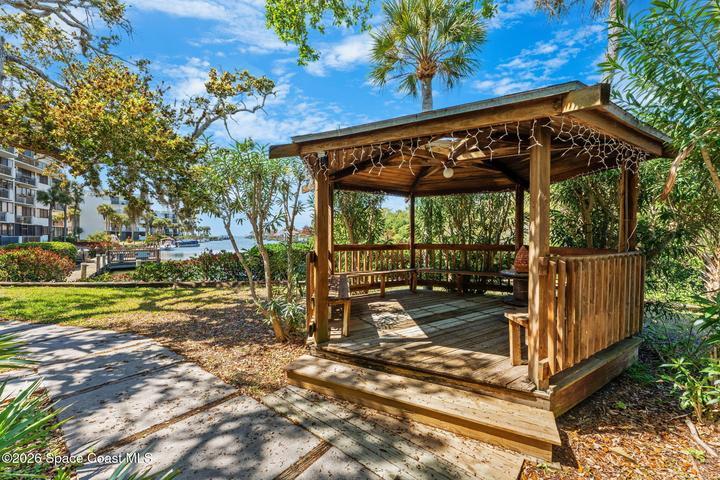 Covered waterfront gazebo at Treasure Island Club overlooking the canal and Banana River.